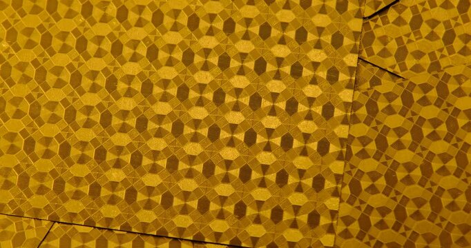 golden playing cards background, back view