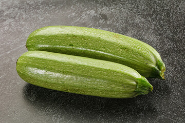 Raw green ripe zucchini vegetable