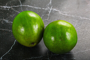 Two ripe green exotic avocado fruit
