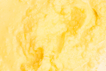 Mashed potatoes close up background. Yellow Mashed potatoes texture.