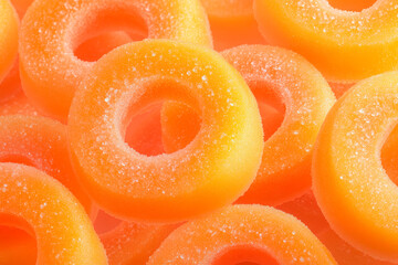 Gummy rings with sugar coating. Round jelly candy close up view.