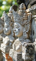 Obraz premium Detailed stone statues of female figures in a row.