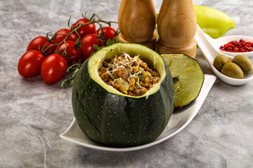 Baked round zucchini with meat