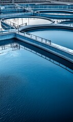 Fototapeta premium Water treatment plant, concrete pools, blue water.