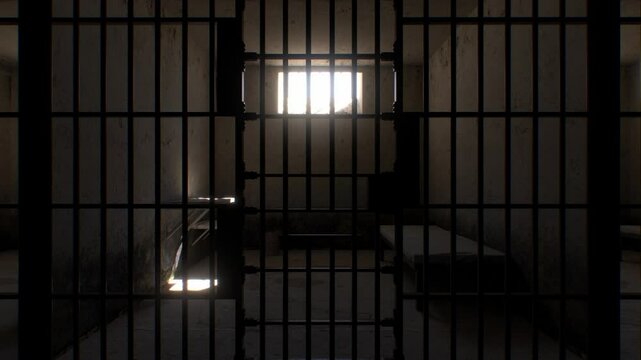 Time passes from morning to evening as sunlight moves across a minimal prison cell containing just a cot, table, and bucket. A high-security, no-frills environment.