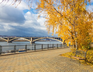 Autumn city landscape. Krasnoyarsk city embankment. Golden autumn.