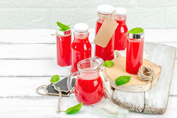 Homemade watermelon kombucha. Healthy probiotic drink, kvass with basil leaves. Fermented beverage