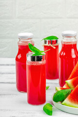 Homemade watermelon kombucha. Healthy probiotic drink, kvass with basil leaves. Fermented beverage