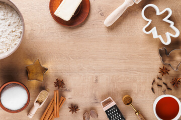 Top view of the Christmas culinary background. Ingredients for baking cookies:flour, rolling pin,...