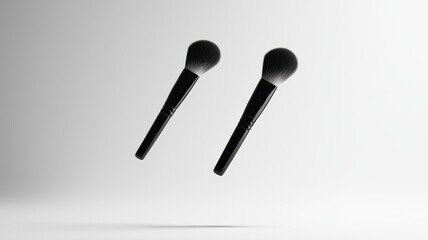 Two makeup brushes beside open compact powder on studio backdrop,Makeup artist tools,an array of professional make-up brushes,showcasing beauty tools for daily makeup application.