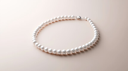 Obraz premium A white pearl necklace is laying on a table