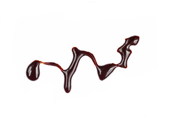 Chocolate sauce stains on white background