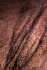 dark gray colored wool blanket on background