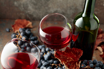 Red wine and blue grapes.