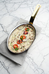 Mushroom sauce with champignons, beef, tomato and cream