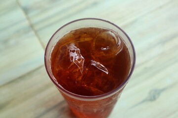 A glass of refreshing cold sweet tea, close up view.