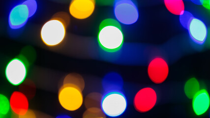 Fototapeta premium Vibrant Defocused Bokeh Lights, Abstract Festive Background in Vivid Colors