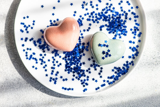 Romantic table setting with hearts and star confetti