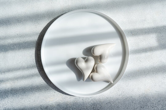 Simple heart-themed table setting for romantic occasions