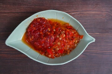 Traditional Indonesian sambal is sambal garlic (red chili sauce), which is served in a bowl