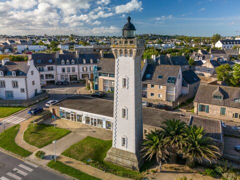 Aerial view of the historic Roscoff Lighthouse (Phare de Roscoff) on a sunny day in Roscoff, France
