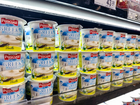 Supermarket shelves filled with Pascual Greek style yogurt variety