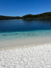 Breathtaking seascape with tropical sandy beach on sunny day