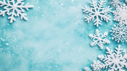 Delicate pastel blue watercolor holiday frame adorned with soft snowflakes for a serene seasonal touch.