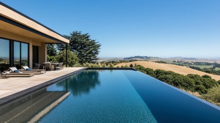 Fototapeta premium Modern Home with Pool and Scenic Landscape View