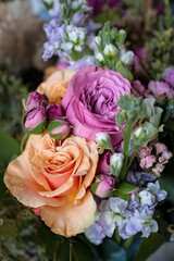 Vibrant floral arrangement with pink and peach roses