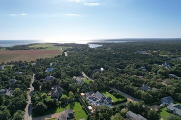 Aerial view of houses surrounded by lush greenery. Katama, Martha's Vineyard