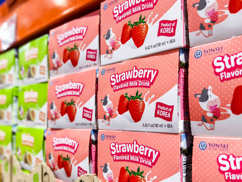Yonsei Strawberry flavored milk drink boxes on supermarket shelf