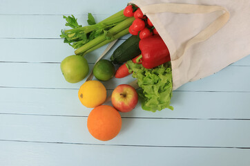 Groceries in eco bags with vegetables Which shopping bag and cotton shopper as eco friendly, flat...
