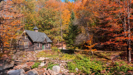 Pretty house in the heart of the Canadian countryside in autumn