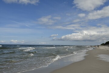 Serene coastal beach with gentle waves