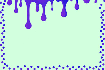 Naklejka premium Purple lilac blue paint drops running down the azure wall