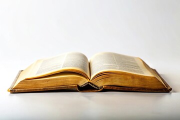 Open bible on white background with aged pages as seen from below