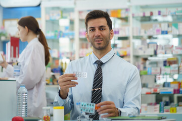 Pharmacists work in drug stores, selling products and giving advice to customers.