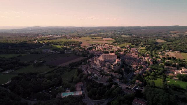 Aerial footage of Grignan commune on a sunny day in Drome department, Auvergne-Rhone-Alpes, France