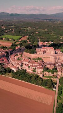 Vertical aerial footage of Grignan village in the Drome department, Auvergne-Rhone-Alpes, France