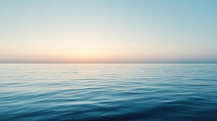 Fototapeta premium Calm Ocean View Under Soft Sunrise Sky