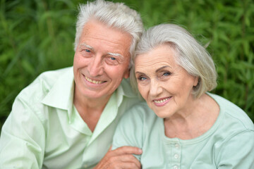Portrait of beautiful senior couple posing in the park
