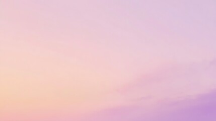 A soft, pastel pink and yellow gradient sky with faint clouds.