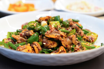 blanched cockles seasoned with sesame oil, green onion, chili, soy sauce and sesame seeds