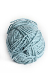 ball of blue wool isolated on white 