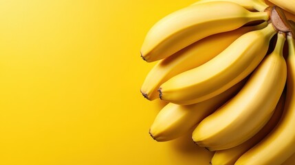 A delightful bunch of ripe bananas neatly arranged on a yellow surface, highlighting the fruit's freshness, natural appeal, and nutritional value with artistic finesse.