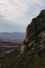Large grey rock mountains and valley