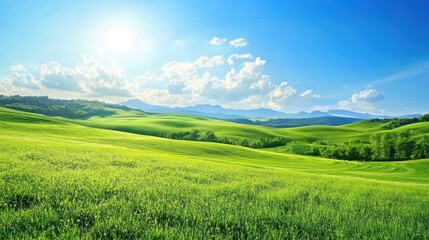 Obraz premium Scenic Rolling Hills Under Bright Blue Sky