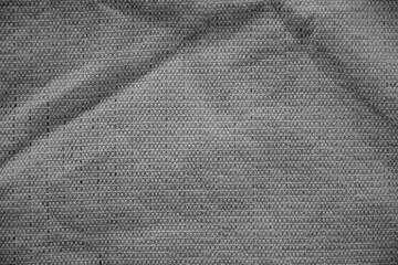 Processed image of fluffy gray doormat from bathroom in grey color