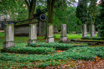 old soviet cemetery with a red star on the tombstone. cemetery of Russian soldiers fighting in...